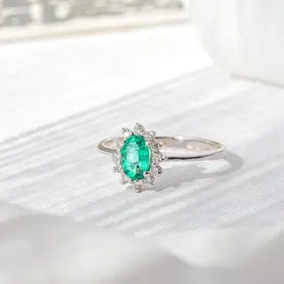 ANILLO ORO ESMERALDA Y BTE 0.47CT 0.15CT                                                            