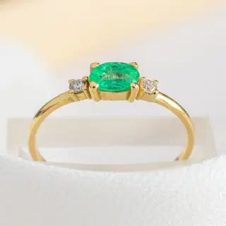 NILLO ORO 18K EMERALDA Y BTE                                                                        