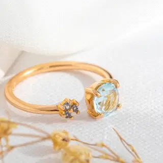 ANILLO ORO ROSA 18K TOPACIO AZUL                                                                    